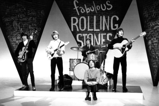 The Rolling Stones during a TV performance in 1964.