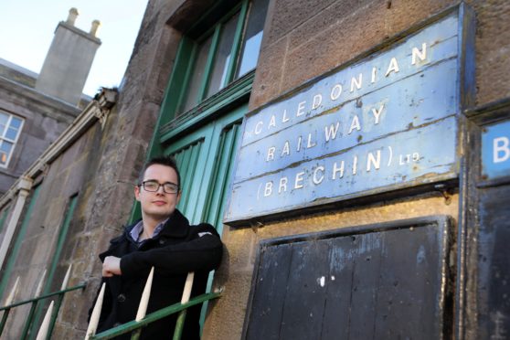 Braden Davy at Brechin Railway Station, is making a bid to bring back Beeching railways.