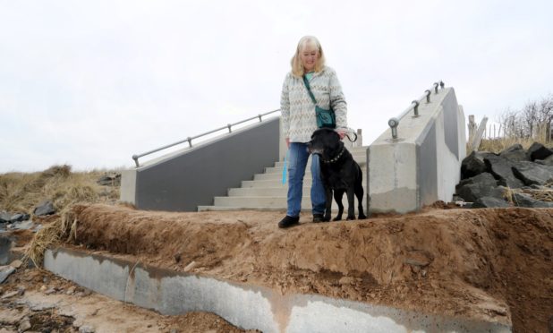 Marilyn Mauran walking her dog "Ben" on Broughty esplanade.