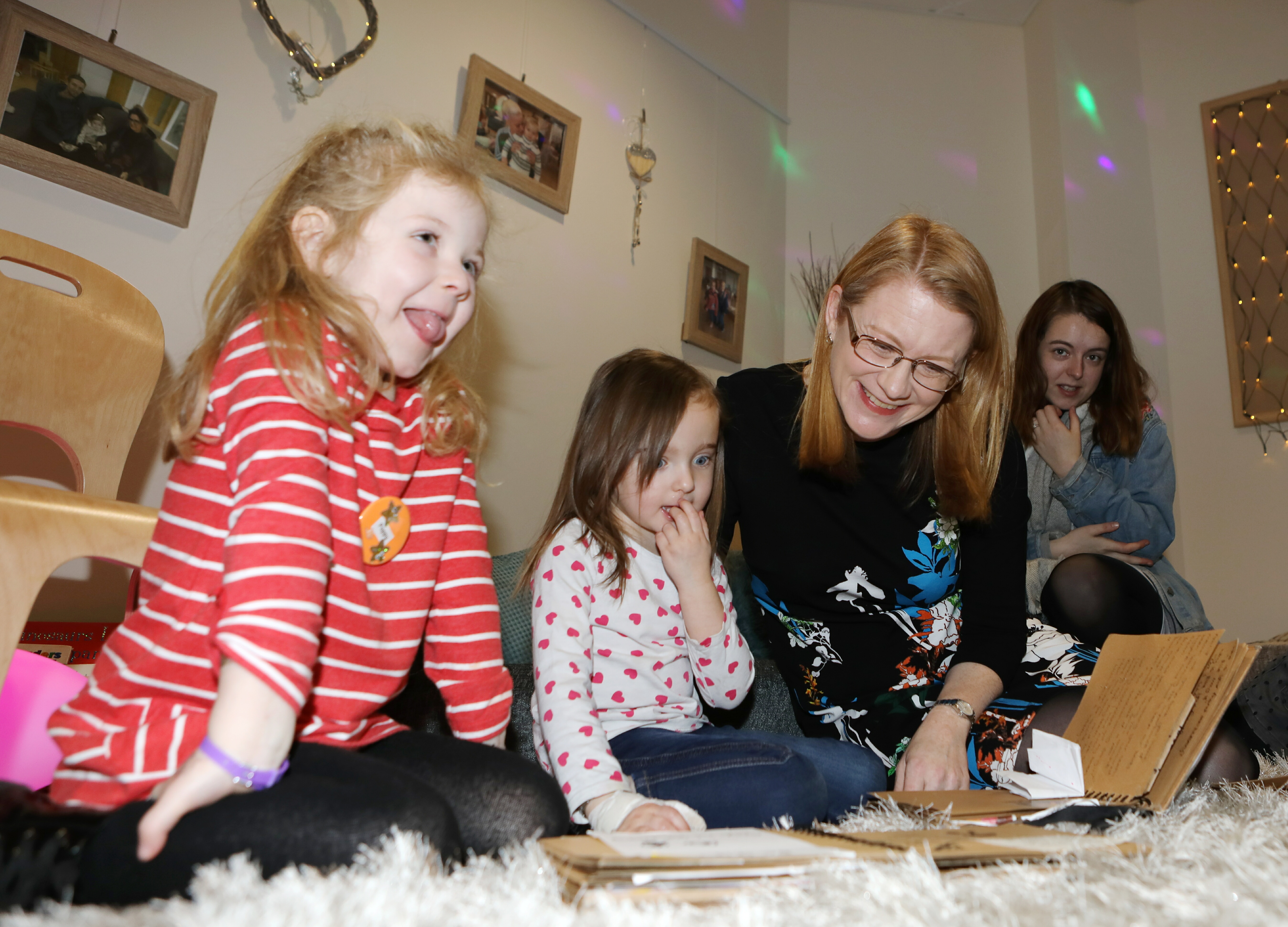 Four-year-olds Poppy Vaughan (left) and Meah Ramsay with Social Security Secretary Shirley-Anne Somerville