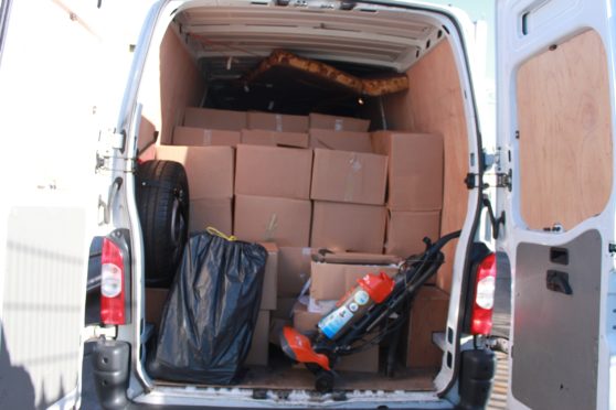 the van packed with boxes