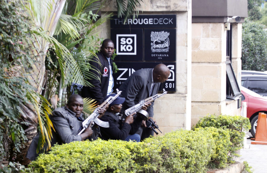 Security forces are seen at the scene of a blast in Nairobi.