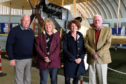 With the replica BE2 aircraft at a recent visit to Montrose Air Station (from left) MASHC chairman Ron Morris, Claire Carr RAF Museum Cosford, Maggie Appleton CEO RAF Museum and Alan Doe MASHC.   Picture: Neil Werninck