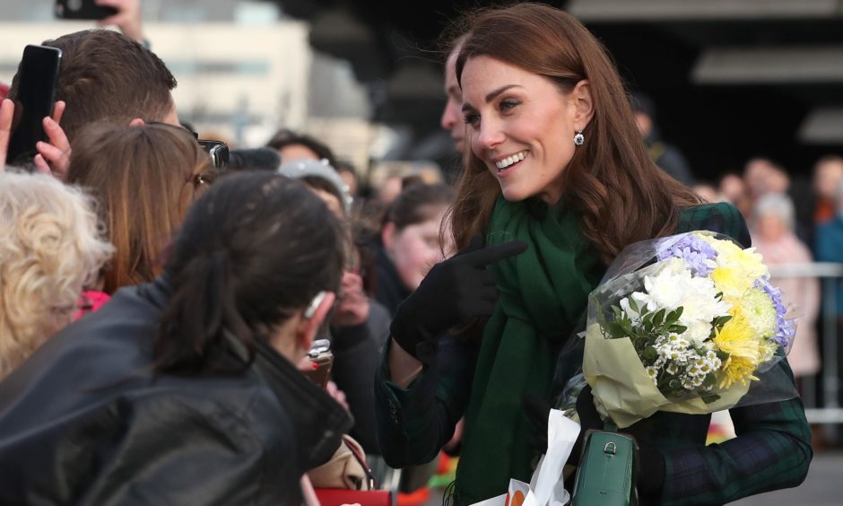 Kate greets members of the public on the waterfront during a walkabout. Jane Barlow/PA Wire