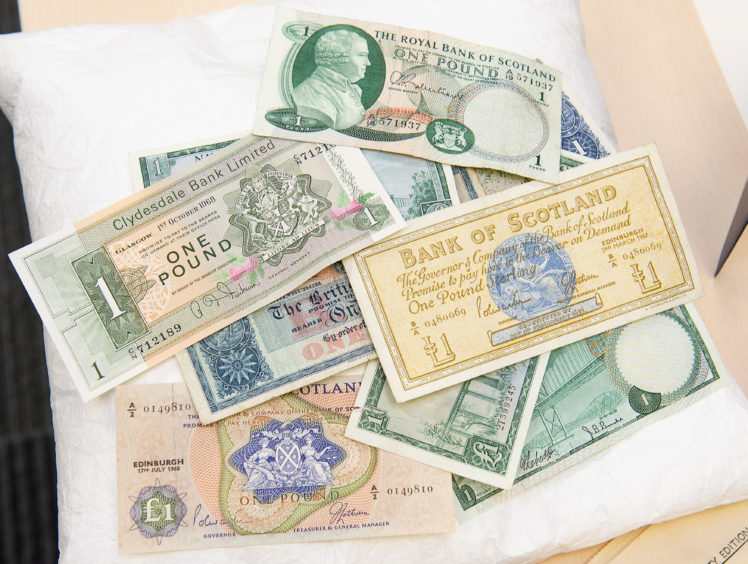 A  selection of currency which was discovered in a time capsule during redevelopment work at Stirling university.