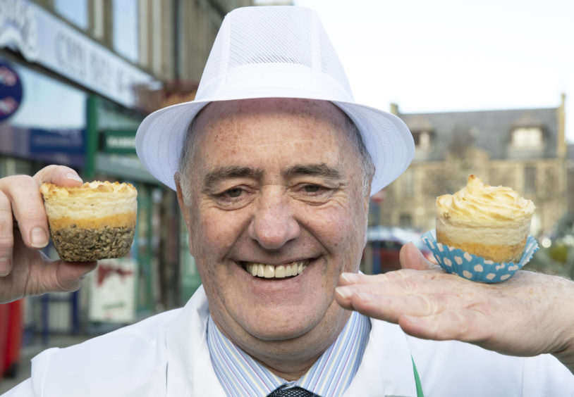 Fraserburgh based butcher Alistair Bruce celebrating as his haggis cupcakes scooped top prize in the Scottish Craft Butchers Haggis Products Awards.