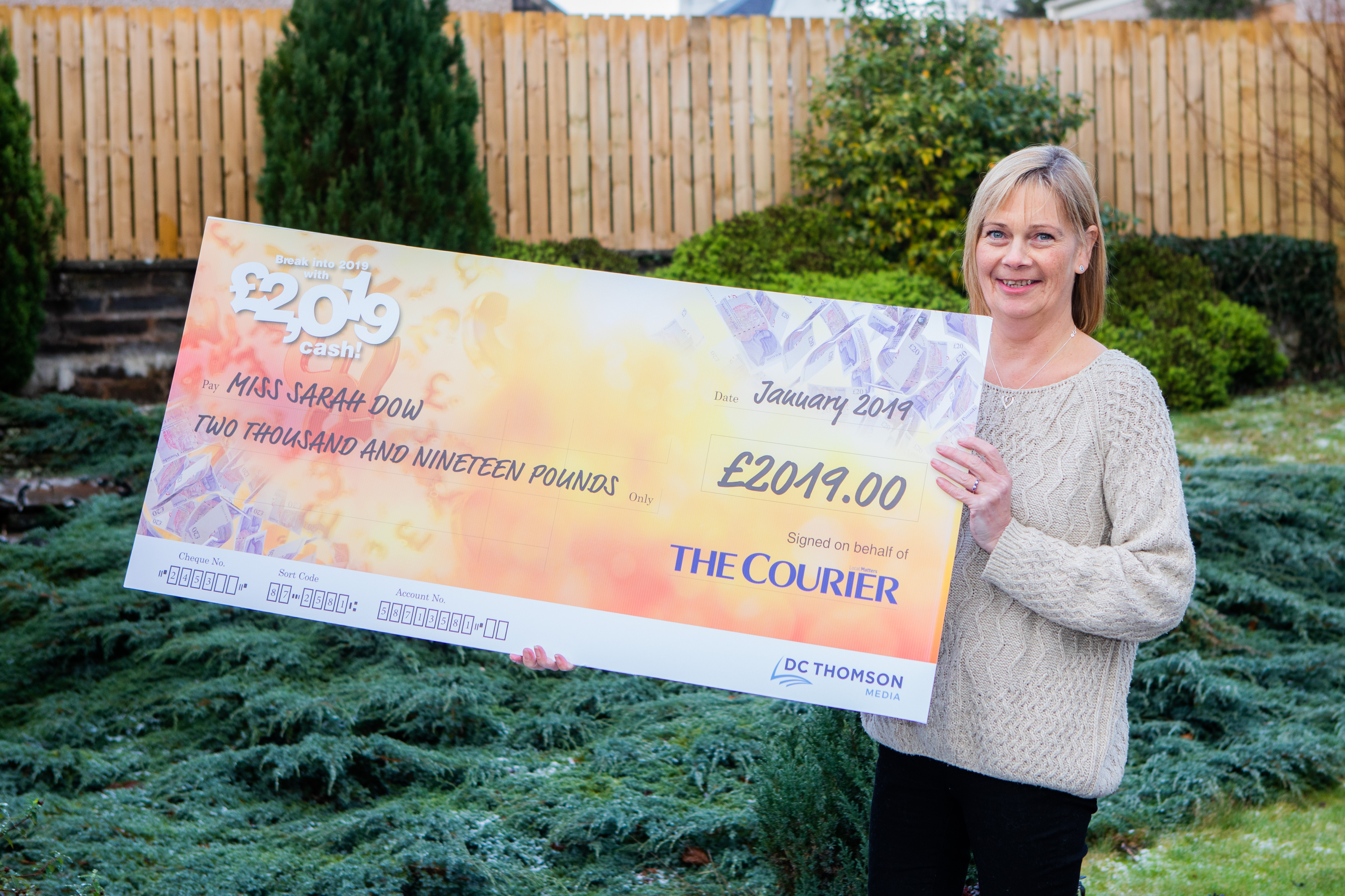 Courier News, Ross Gardiner Story, CR0005714 £2019 presentation - Pictures of Sarah Dow who won a cash prize of £2019 with The Courier competition. Picture shows Sarah Dow with the cheque. 2 Mansfield Road, Scone. Tuesday 22nd January 2019  Pic Credit - Steve MacDougall / DCT Media