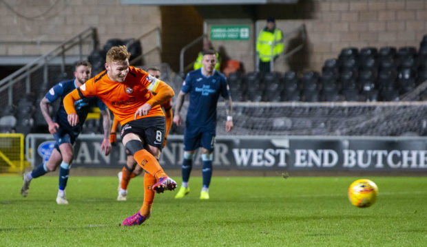 Fraser Fyvie slots away his penalty.