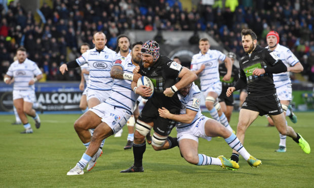 Tim Swinson leads the charge for Glasgow against the Blues.