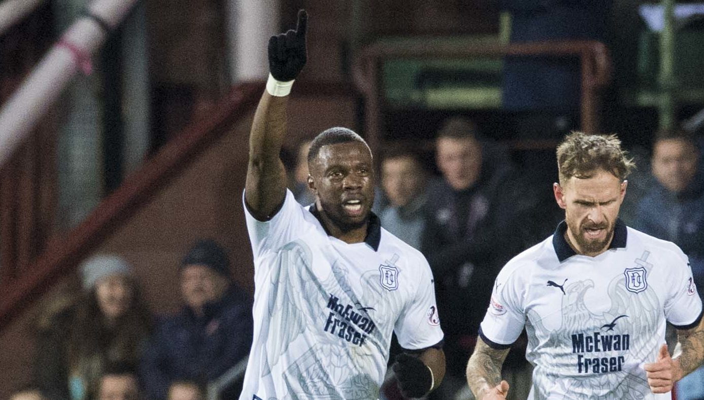 Dundee's Genseric Kusunga (L) celebrates his goal.