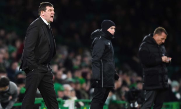 Tommy Wright shouts orders to his players at Celtic Park.