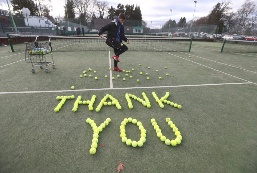 Tennis coach Josh Thomson with tennis balls laid out at Dunblane Tennis Club in Andy Murray's home town, he has said he is aiming to end his career after Wimbledon but the Australian Open may be his last tournament.