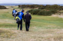 Caddie Simon Blackmore (44) with his golfer Henry McTaggart (76) from Dundee
