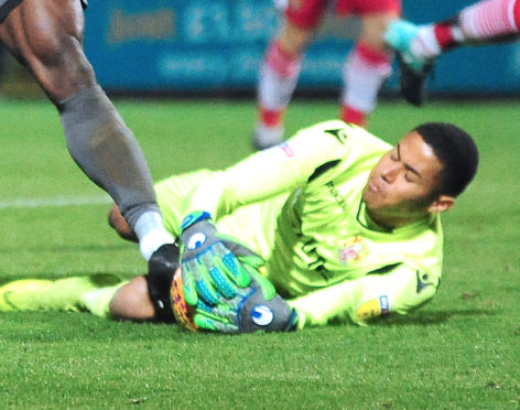 Seny Dieng playing for Stevenage.