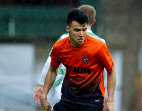 A young Scott Fraser in action for Dundee United against Celtic.