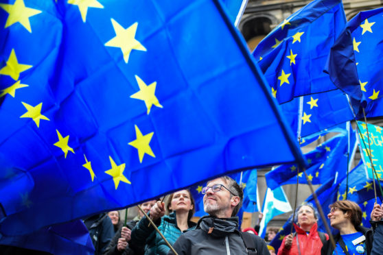 People attend a Rally for Europe outside Augustine United Church in Edinburgh.