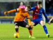Billy King in action for United against Inverness Caley Thistle.
