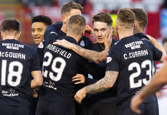 Scott Wright celebrates after scoring for Dundee.