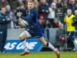 Finn Russell in action for Scotland.