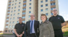 Councillor Judy Hamilton meets up with caretakers at Methil's Swan Court. From left to right Brian Dryburgh, Housing manager Peter Nicol, Mrs Hamilton and Bill Barker