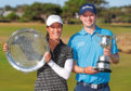 GEELONG, AUSTRALIA - FEBRUARY 10: Celine Boutier of France and David Law of Scotland pose with their winners trophies during day four of the ISPS Handa Vic Open at 13th Beach Golf Club on February 10, 2019 in Geelong, Australia. (Photo by Michael Dodge/Getty Images)