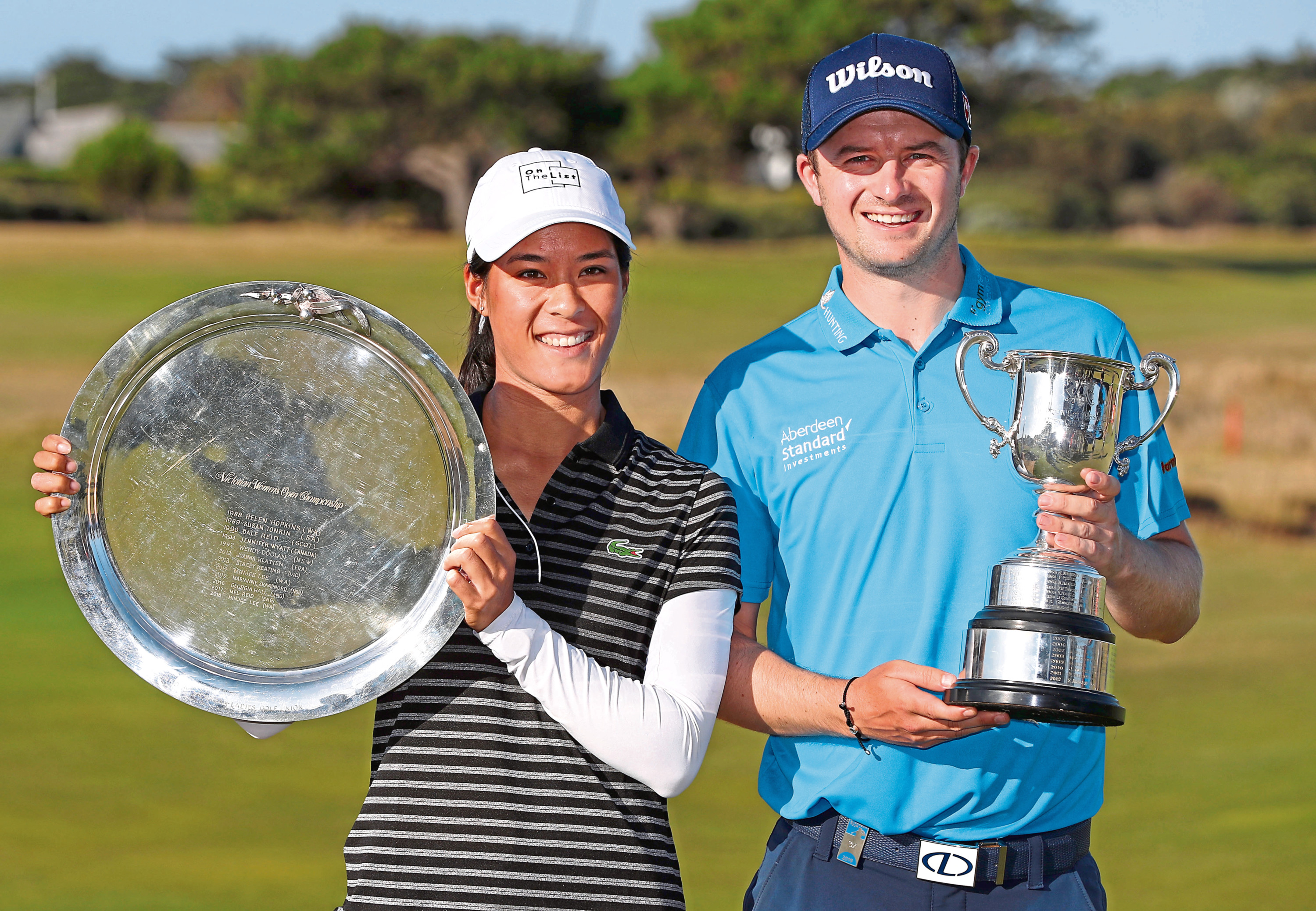 GEELONG, AUSTRALIA - FEBRUARY 10: Celine Boutier of France and David Law of Scotland pose with their winners trophies during day four of the ISPS Handa Vic Open at 13th Beach Golf Club on February 10, 2019 in Geelong, Australia. (Photo by Michael Dodge/Getty Images)