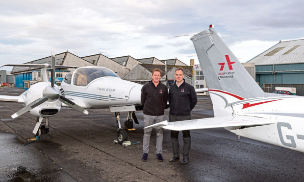 ACS Aviations group technical director Craig McDonald with  managing director Graeme Frater. Picture: Wallace Shackleton