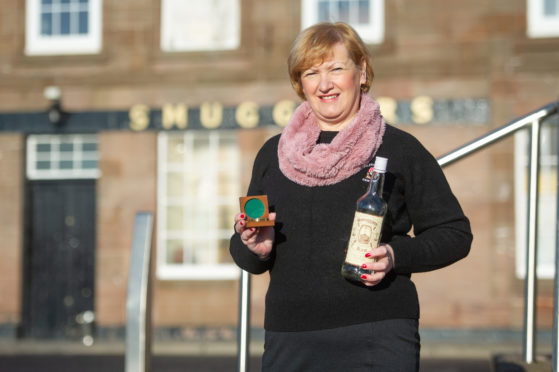 Courier News - Angus - Jim Millar story; CR0005899 Tales of a ghostly piper have prompted an Angus councillor to call for more awareness of smuggling in the county.  Picture Shows; Councillor Brenda Durno with some of the Smugglers Tavern curios, Smugglers Tavern, East Grimsby, Arbroath Harbour, Arbroath, 01st February 2019. Pic by Kim Cessford / DCT Media