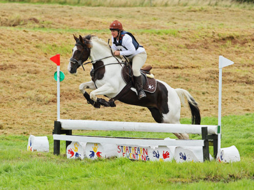 Karen and Connie compete in a bitless bridle.