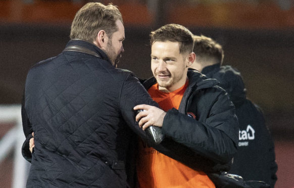 Dundee United manager Robbie Neilson at full-time with new signing Peter Pawlett.