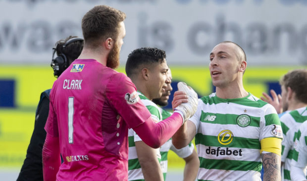 Respect: Zander Clark shakes hands with Celtic captain Scott Brown at full-time on Sunday.