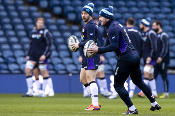 Greig Laidlaw and Stuart Hogg testing the winds at Murrayfield yesterday.