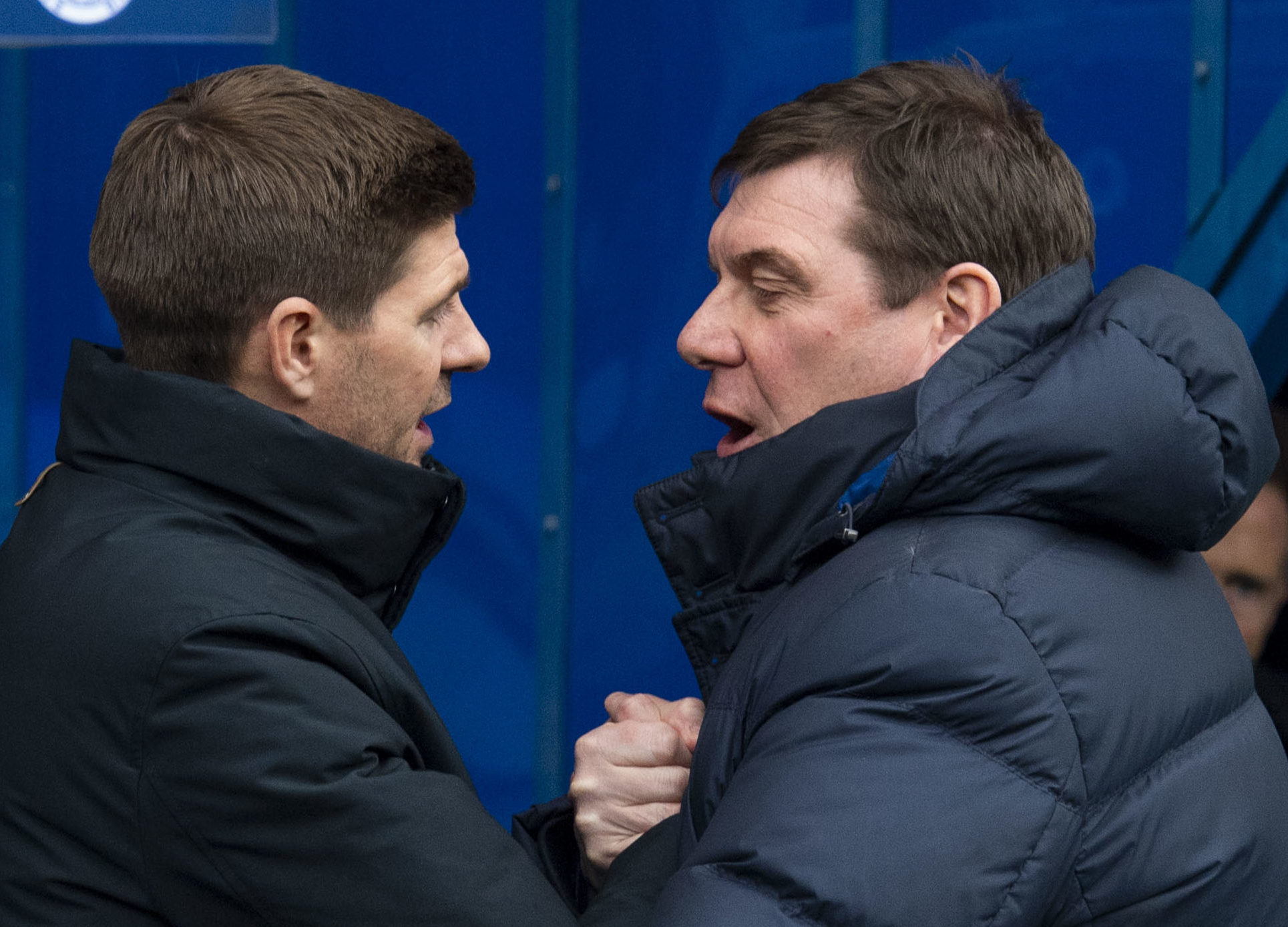 Steven Gerrard and Tommy Wright chat at full-time.