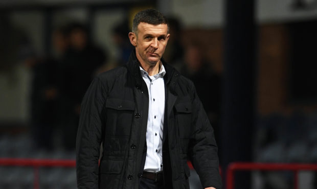 Jim McIntyre at the end of the game.