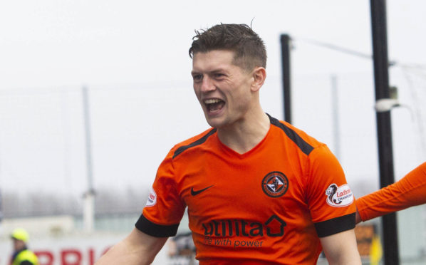 Cammy Smith, left, is joined by Nicky Clark to celebrate his goal.