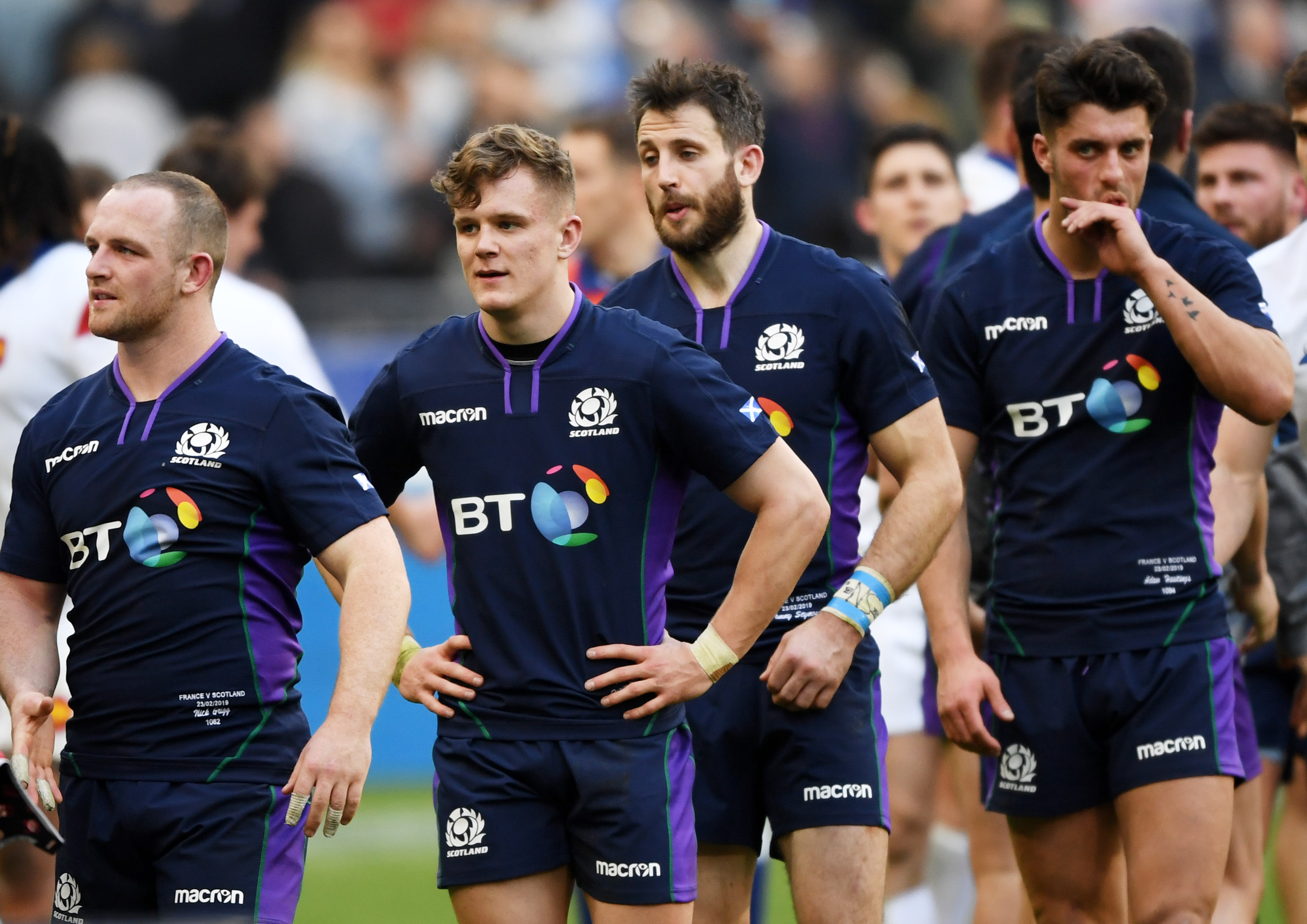 (L-R): Scotland's Nick Grigg, Darcy Graham, Tommy Seymour and Adam Hastings look dejected at full-time in Paris.