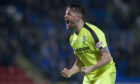 Marc McNulty celebrates after making it 2-1 to Hibs.