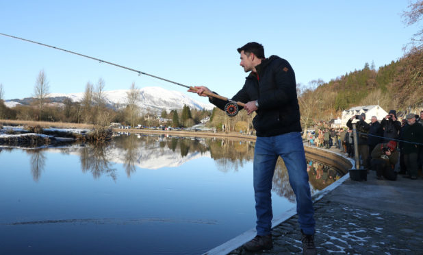Fisherman James Stokoe, winner of the BBC's Big Fish competition launches  fishery season on the River Teith at Callander,
