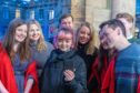 Game of Thrones Actress Maisie Williams with students of St Salvator's Choir.