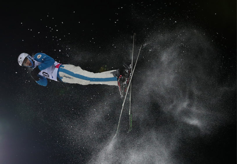 An athlete competes in the freestyle skiing aerials event at the 2019 Winter Universiade at Sopka Cluster in Russia.