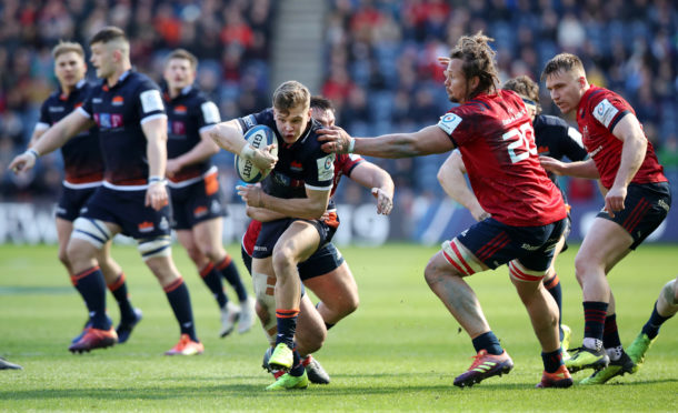 Darcy Graham tries to breach the Munster defence at Murrayfield.