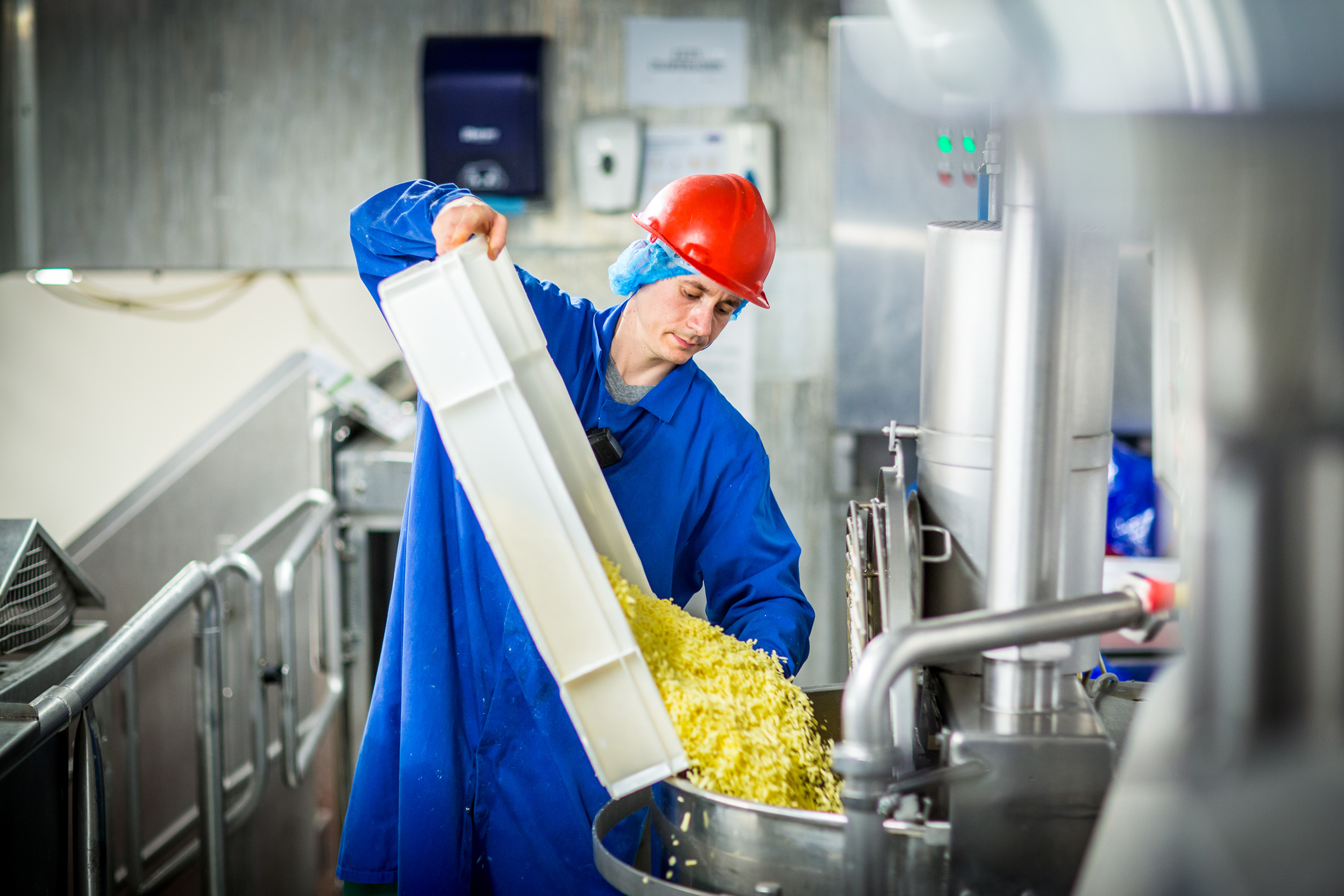 A Strathmore Foods technician loads up for a new batch of macaroni cheese.