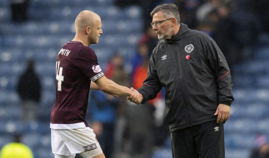 Steven Naismith shakes hands with Craig Levein during their days together at Hearts.