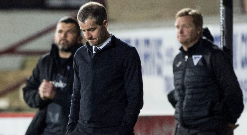 Dunfermline manager Stevie Crawford looks dejected on the touchline