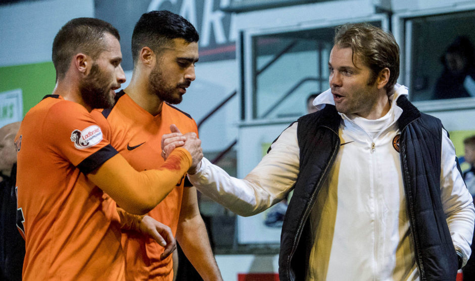 Pavol Safranko (L) with manager Robbie Neilson at full-time