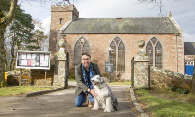 Edzell Parish Church's  Rev Wayne Pearcer with his dog Ben.