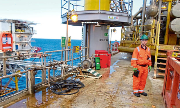 Dan Hawkes, director of Hawkes Health, carrying out a safety inspection