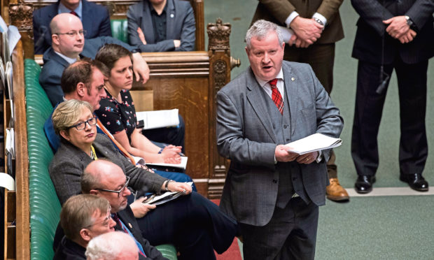The SNP's Westminster leader Ian Blackford speaks during Prime Minister's Questions in the House of Commons, London.