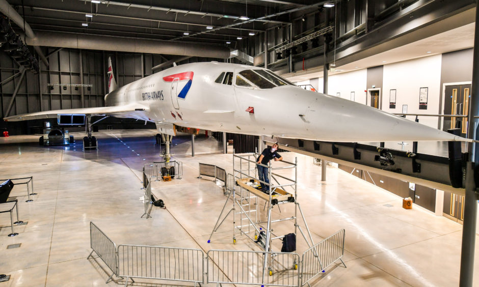 Volunteer engineer James Cullingham inspects a 'droop nose' panel on Concorde Alpha Foxtrot, which was the last Concorde ever to fly, landing at Filton, South Gloucestershire, on November 2003. It is now housed in a purpose-built hangar at Aerospace Bristol where engineers are working on the aircraft in preparation for the 50th anniversary of the first Concorde flight.