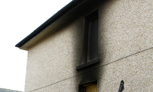 The fire damaged house in Timmons Park in Lochgelly.